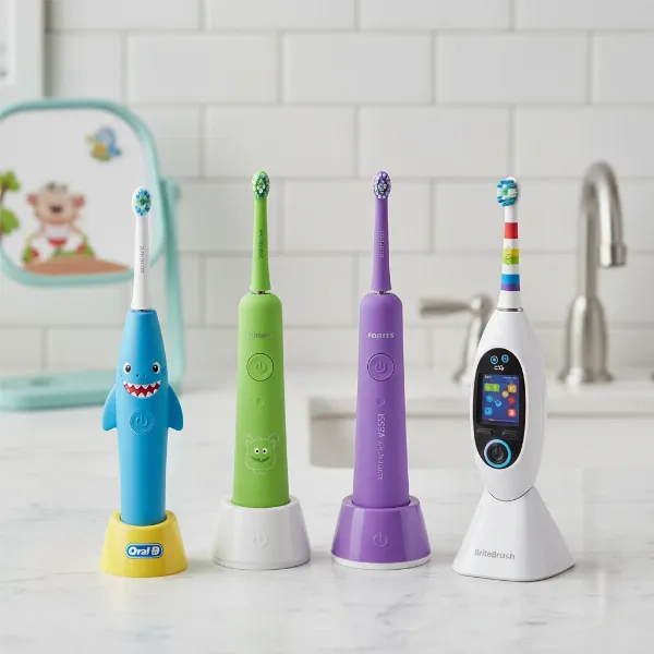 A vibrant display of the top-rated electric toothbrushes for kids, featuring Oral-B Kids, Philips Sonicare for Kids, and Foreo ISSA Kids, arranged attractively on a bathroom counter.