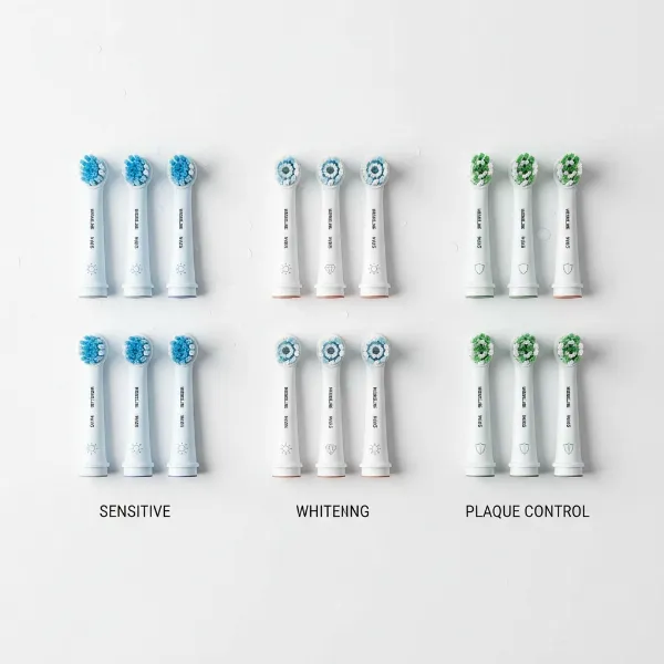 Assortment of different types of electric toothbrush replacement heads for various needs, showcasing options for users.